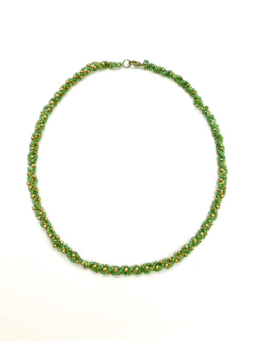 A handcrafted beaded necklace with a unique design and vibrant colors.