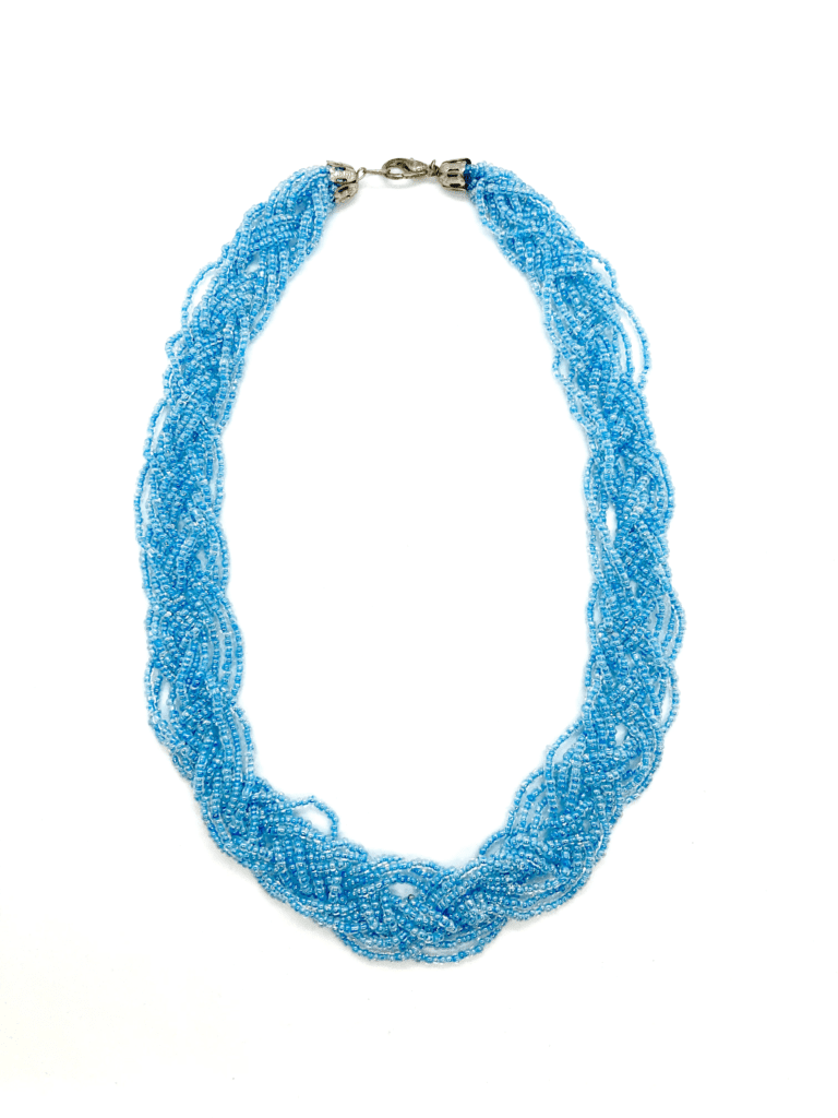 Elevate your style with this stunning blue beaded necklace. The multi-strand design and vibrant color make it the perfect accessory for any occasion.